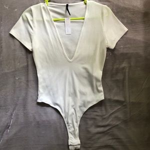 White ribbed deep v body suit